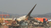 韓国旅客機事故　死者174人に